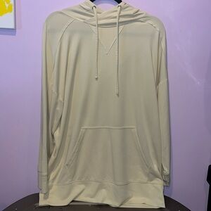 Fabletics nice creamy yellow hoodie size Small up to large oversized soft pocket